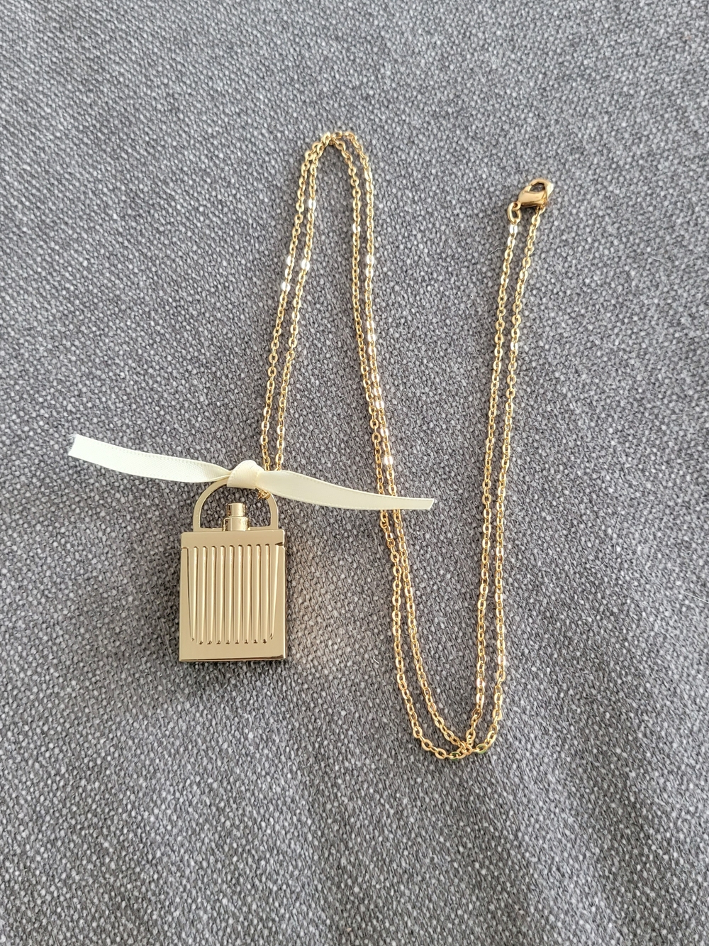 Chloe Gold-tone Padlock Necklace with Cream Ribbon Accent